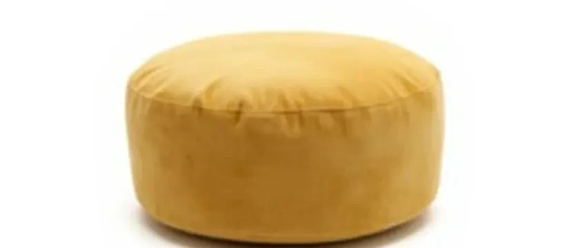 SKKS premium puffy and ottoman cleaning service showing a spotless round grey cushioned footstool